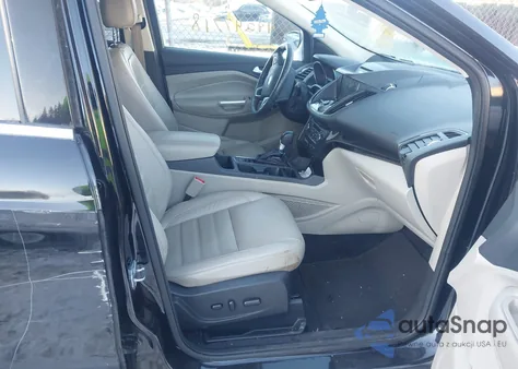 2017 Ford Escape Titanium z USA, uszkodzony, nr VIN 1FMCU9J96HUE18226